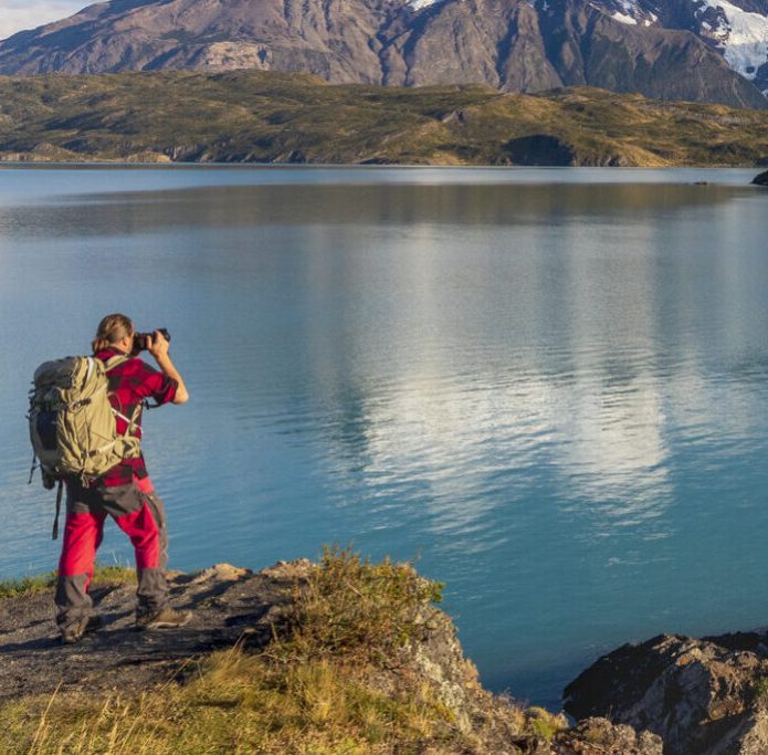 Photographer in Torres del Paine at Lago Pehoe